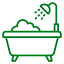 A green icon of a bath tub with a shower head.