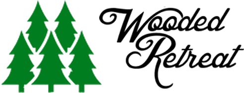 A green banner with a tree and the words " woods reserve ".