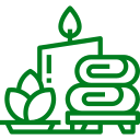 A green icon of candles and towels on a table.